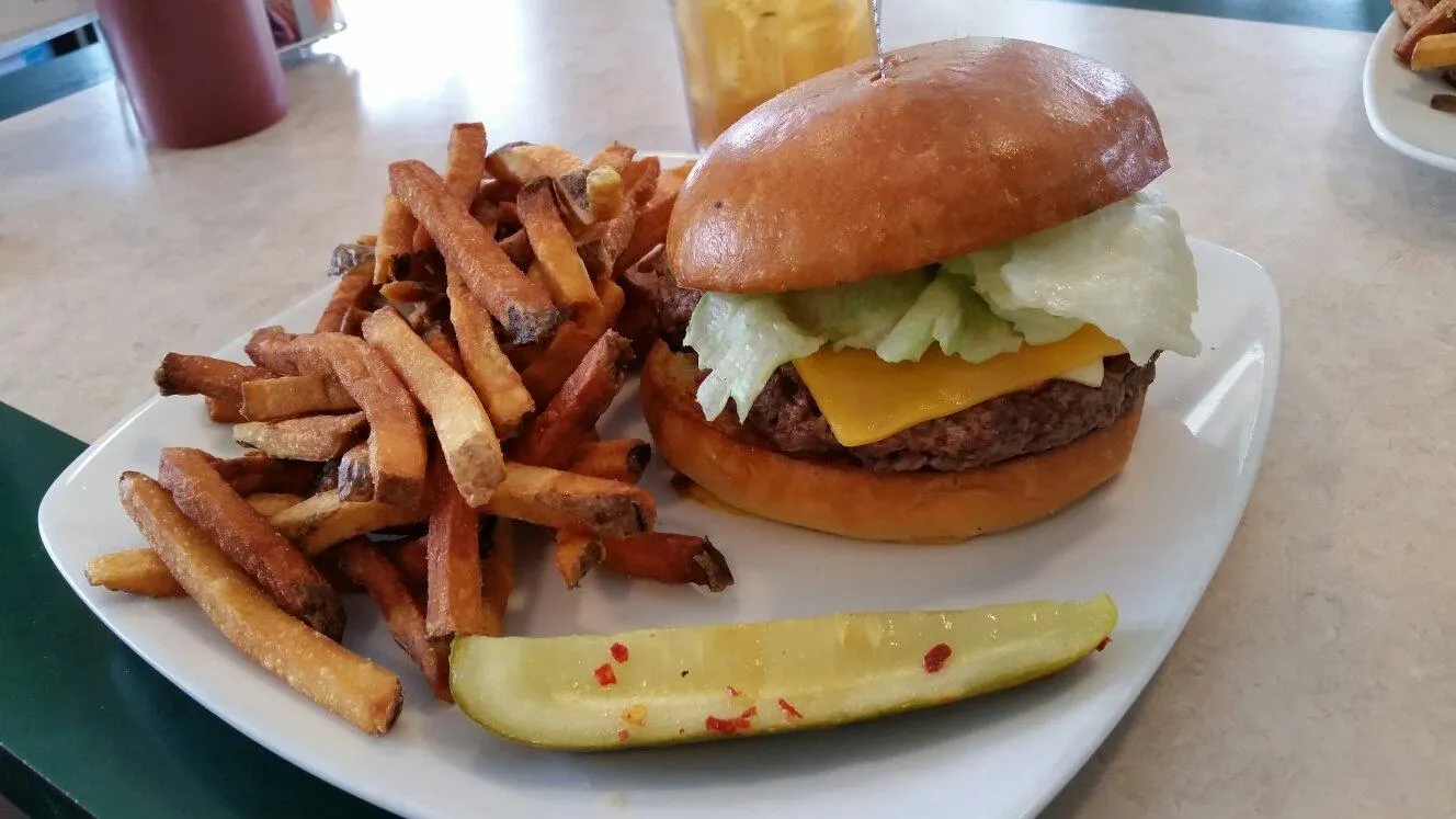 A burger and fries served at CJ's